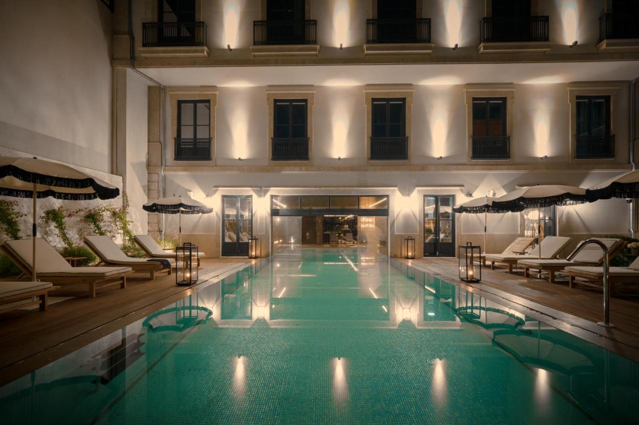Ga Palace Hotel & Spa, A Xixth-Century Villa Porto Exterior foto The pool at the hotel