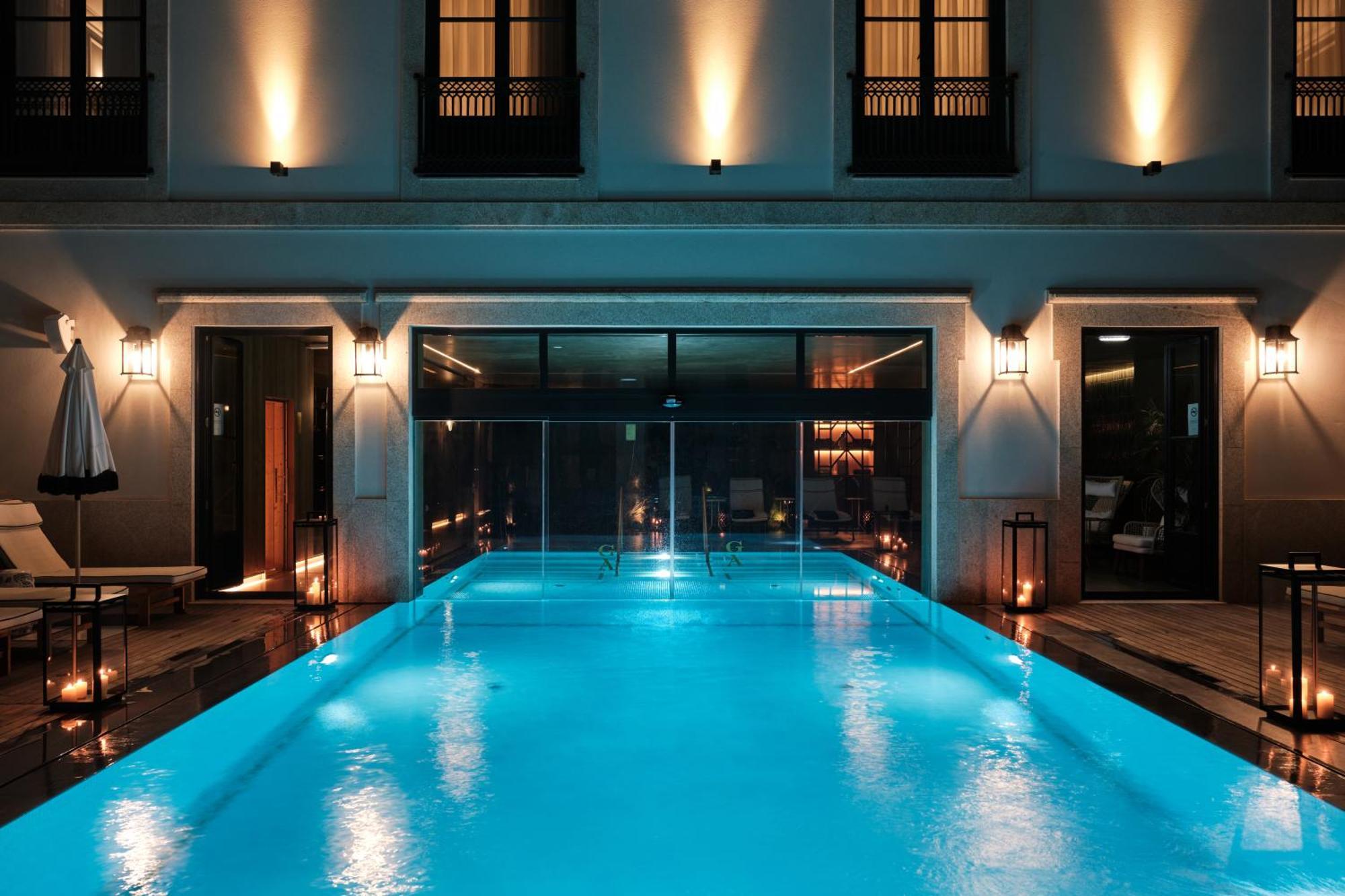 Ga Palace Hotel & Spa, A Xixth-Century Villa Porto Exterior foto The pool at the Hotel Indigo Athens